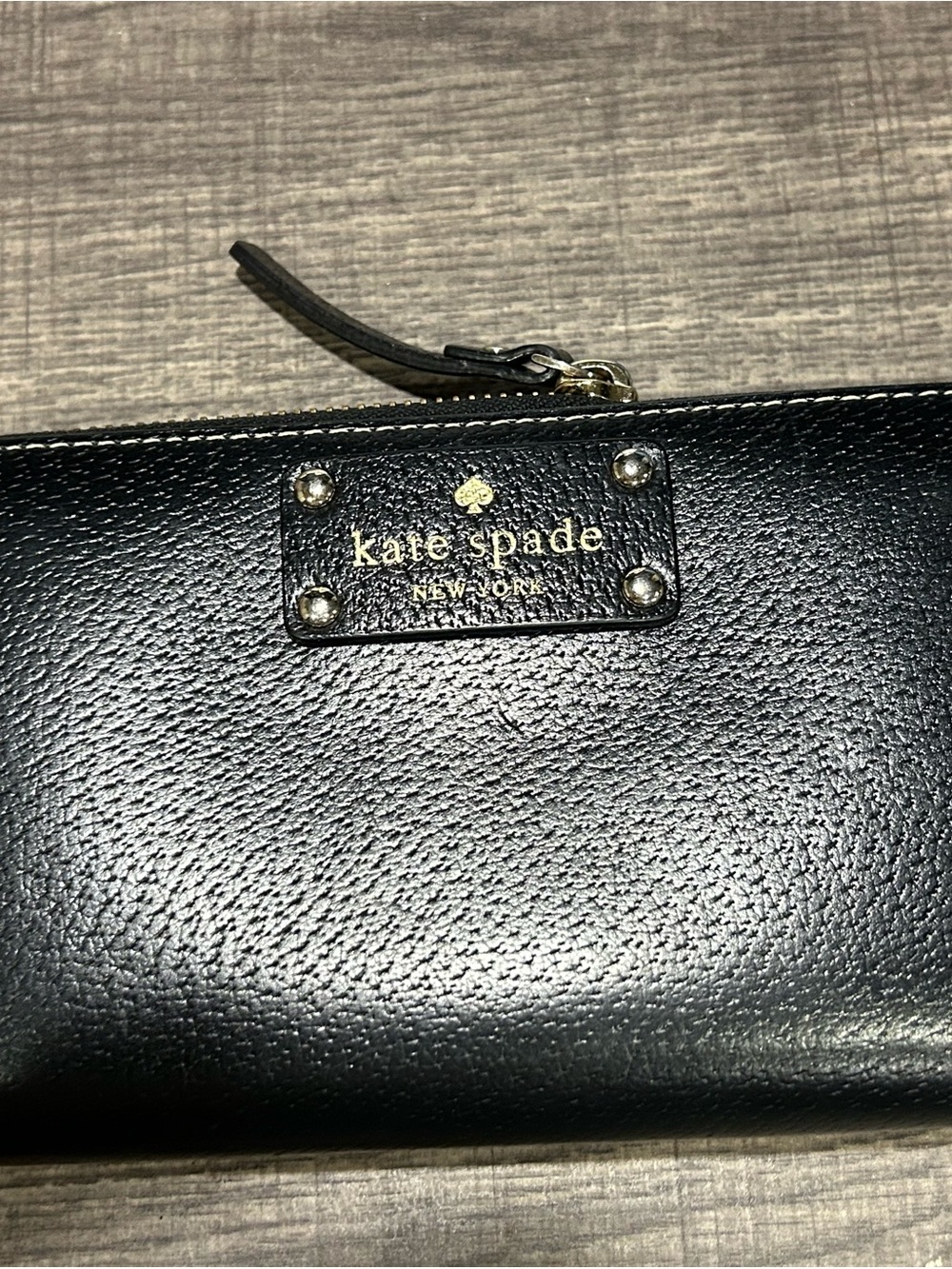 kate spade Black Leather Zip Wristlet with Gold Logo Plate